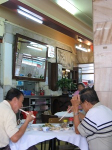 Two uncles enjoying the dim sum... Yum yum... Left uncle: "Yum yum, this is delicious".